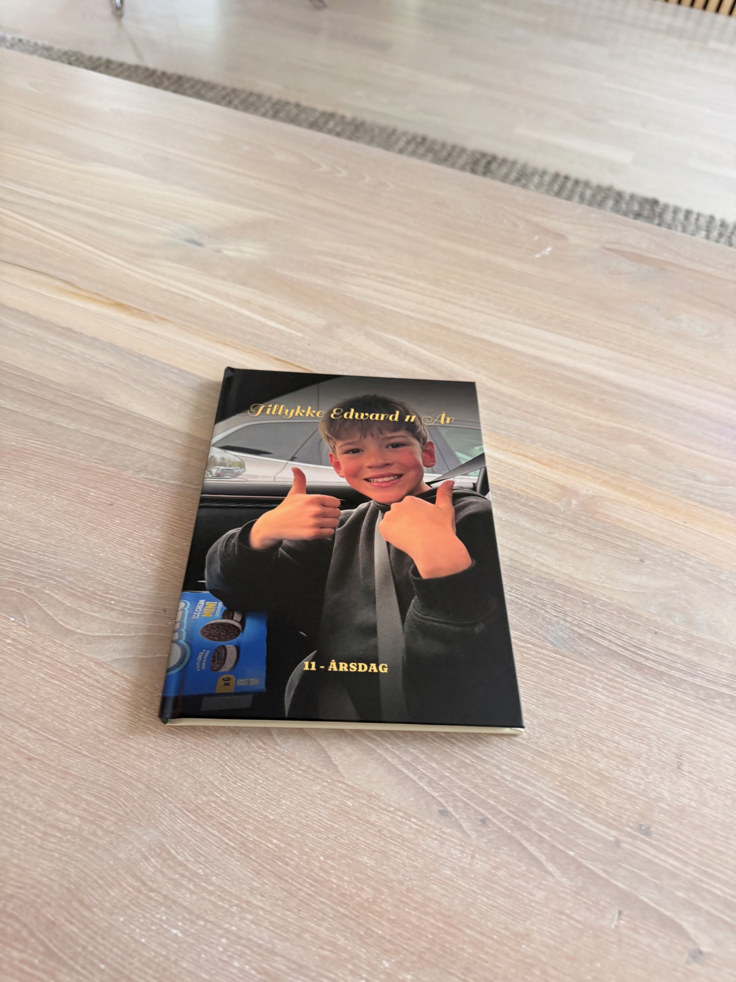 The hardcover from the side, showing its thickness
