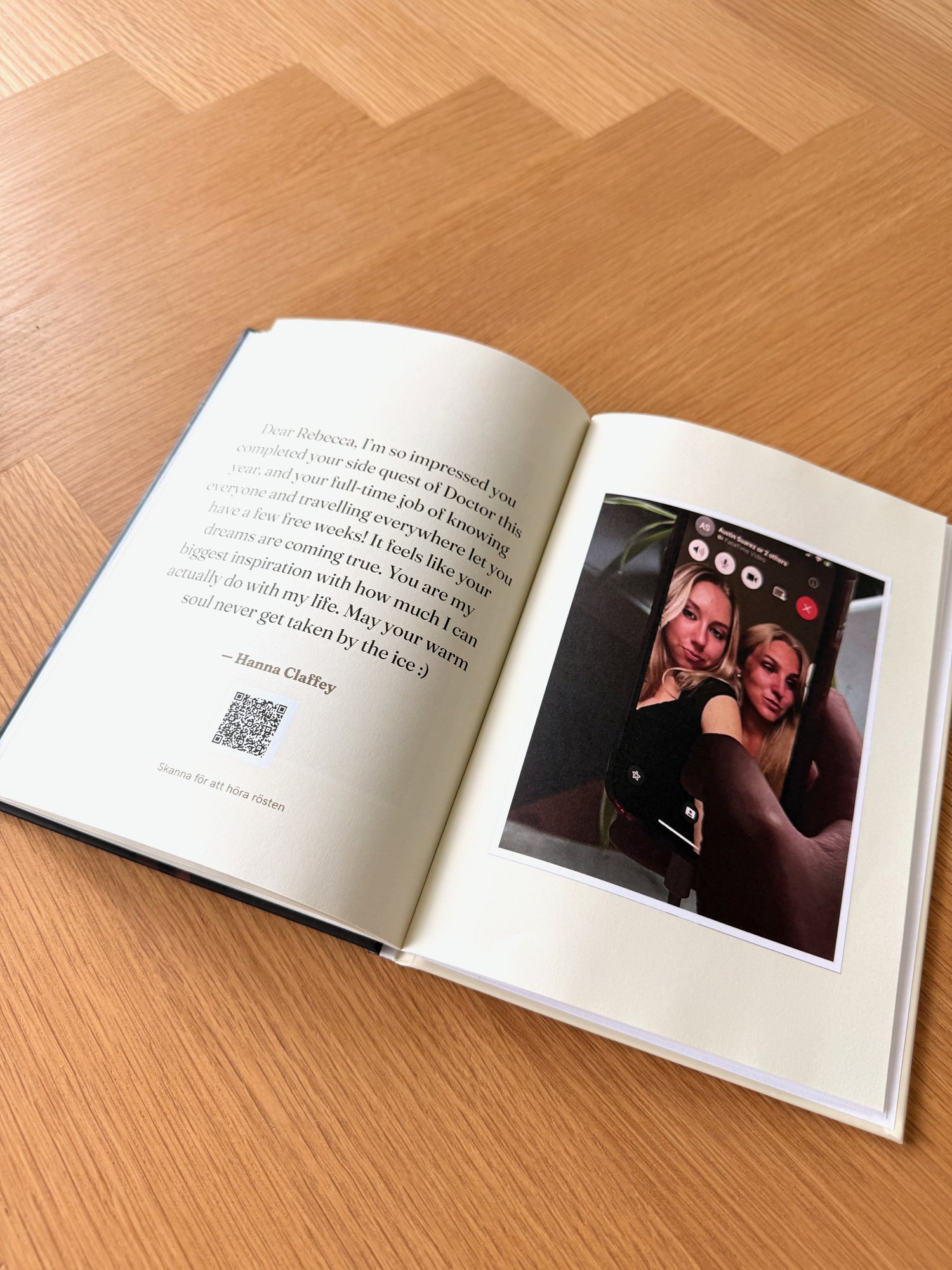 An open spread — a message, a photo and the QR that plays their voice